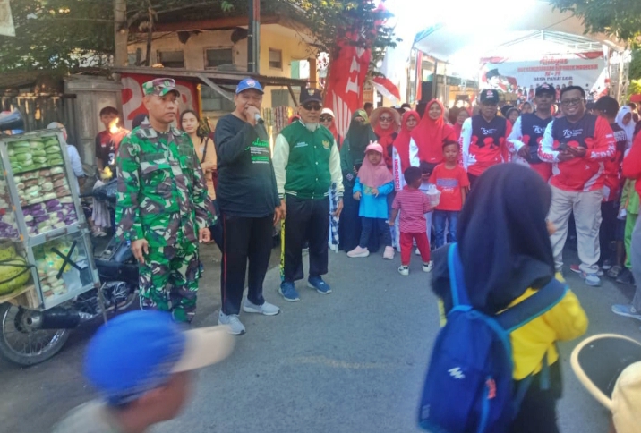 Babinsa Koramil 0823/02 Panji Pastikan Pengamanan Jalan Santai HUT RI Ke-79
